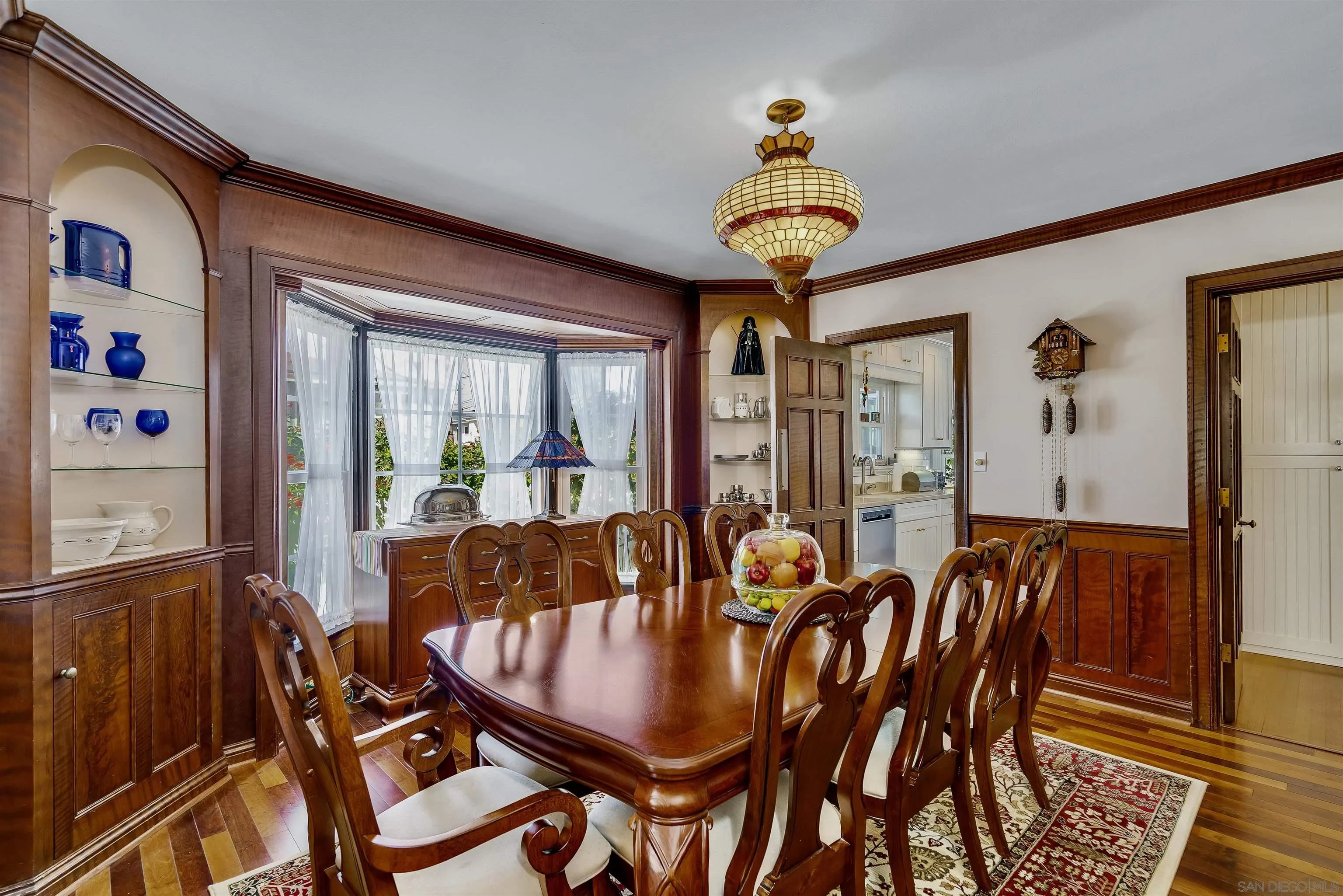 1210 Third Street Coronado, CA 92118 - Photo 15 of 40 a view of a dining room with furniture window and wooden floor