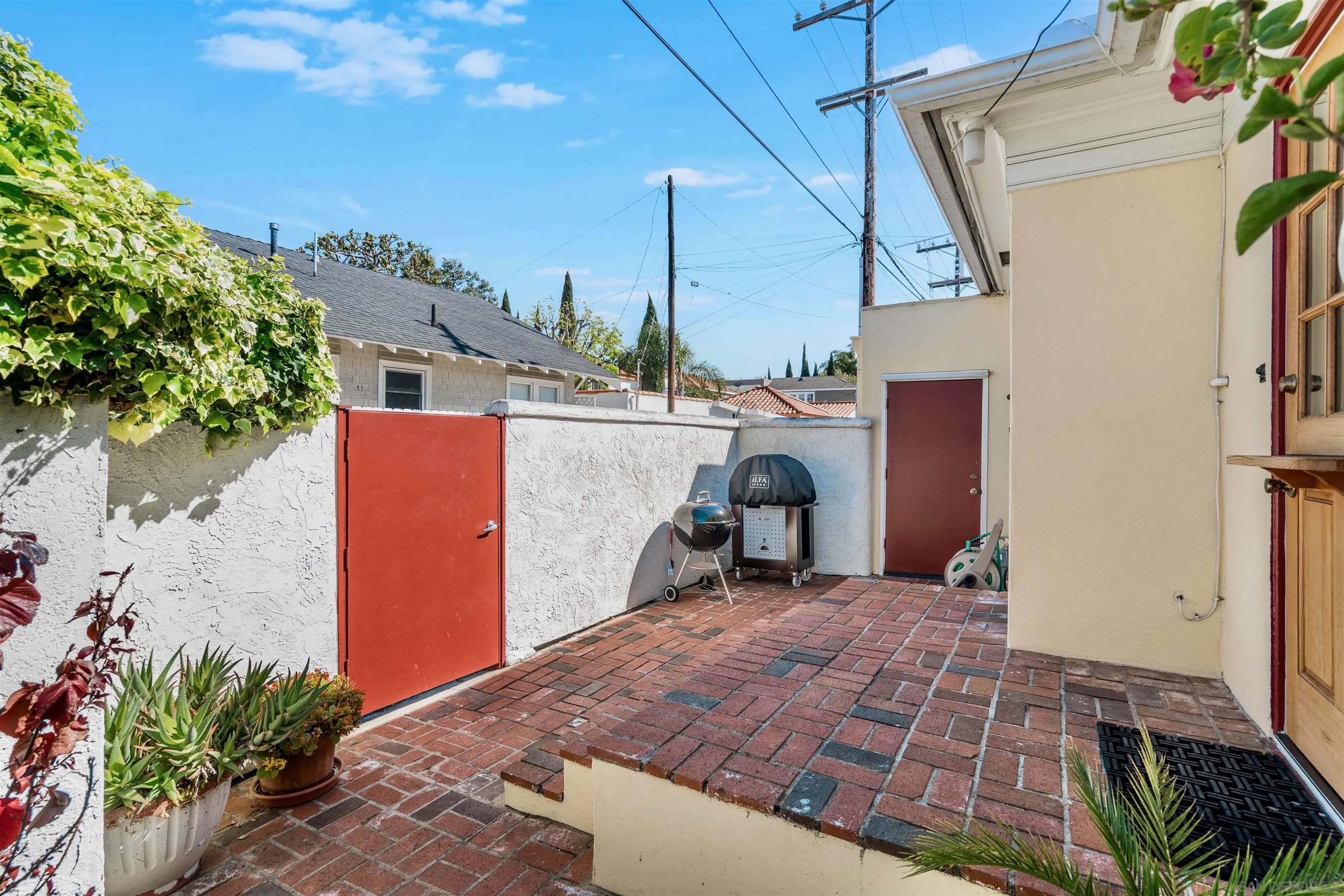 1210 Third Street Coronado, CA 92118 - Photo 29 of 40 a view of a backyard with sitting area