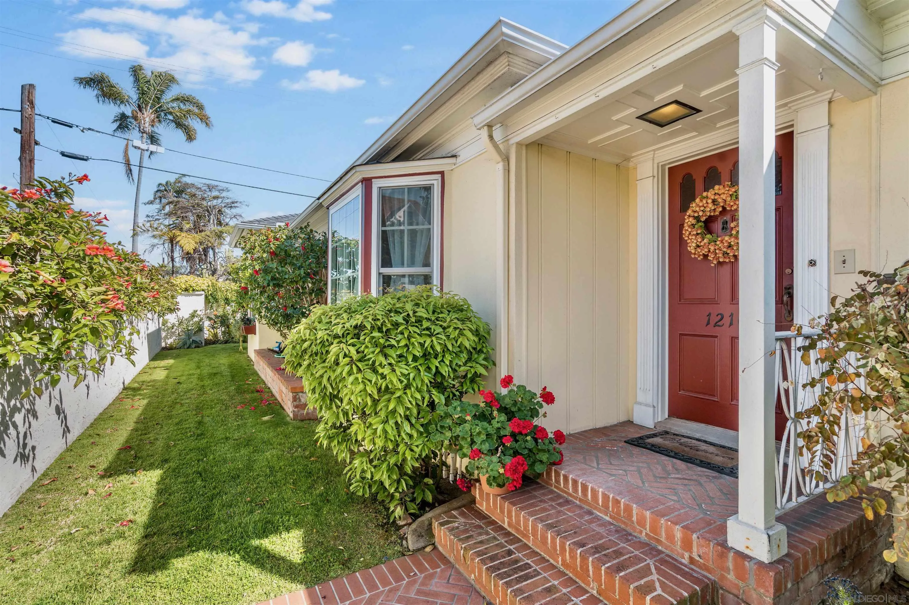 1210 Third Street Coronado, CA 92118 - Photo 32 of 40 a front view of a house with a yard