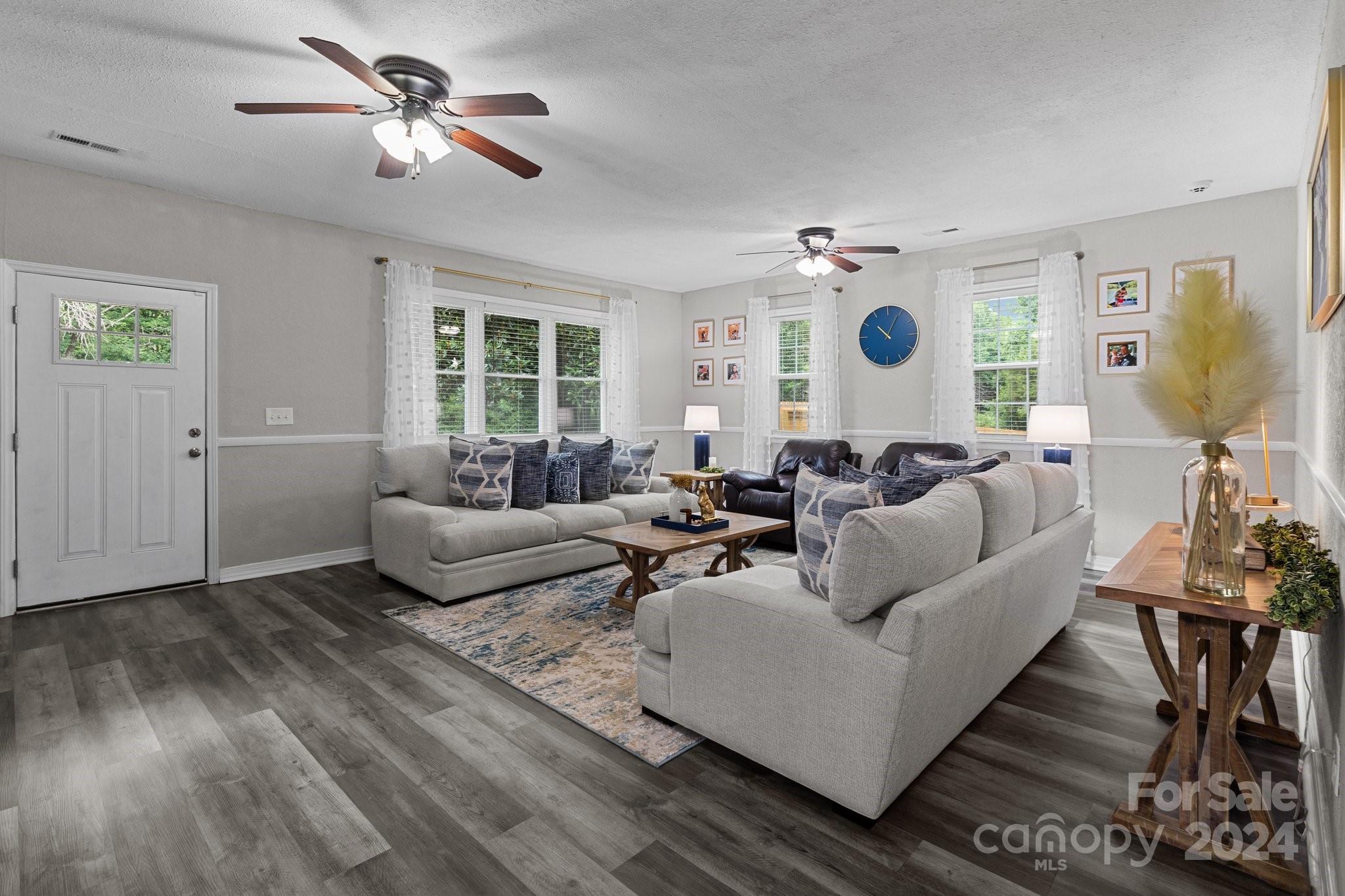 955 Lakeview Road Salisbury, NC 28147 - Photo 18 of 35 a living room with furniture and wooden floor