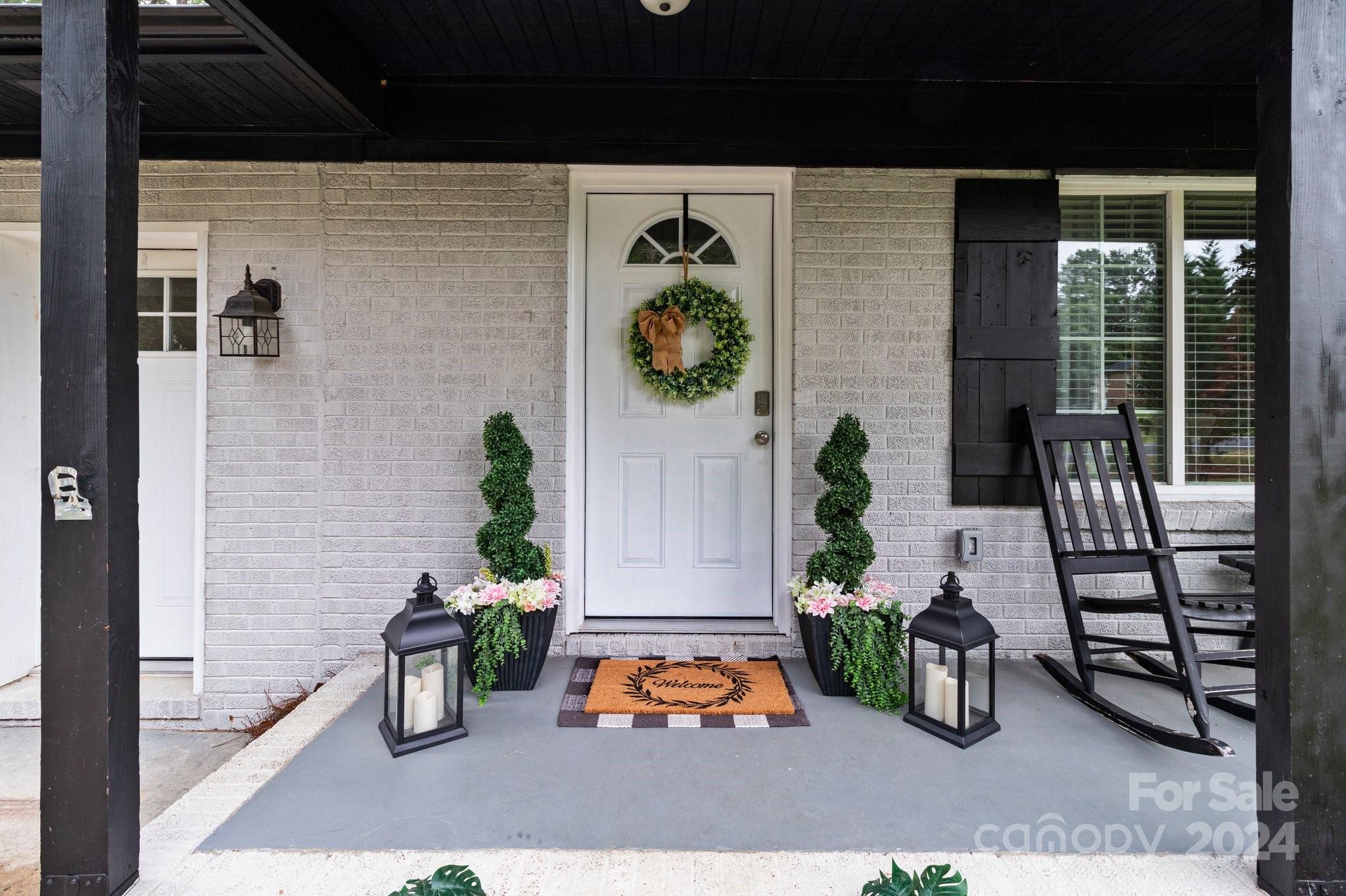 955 Lakeview Road Salisbury, NC 28147 - Photo 3 of 35 a front view of a house with patio
