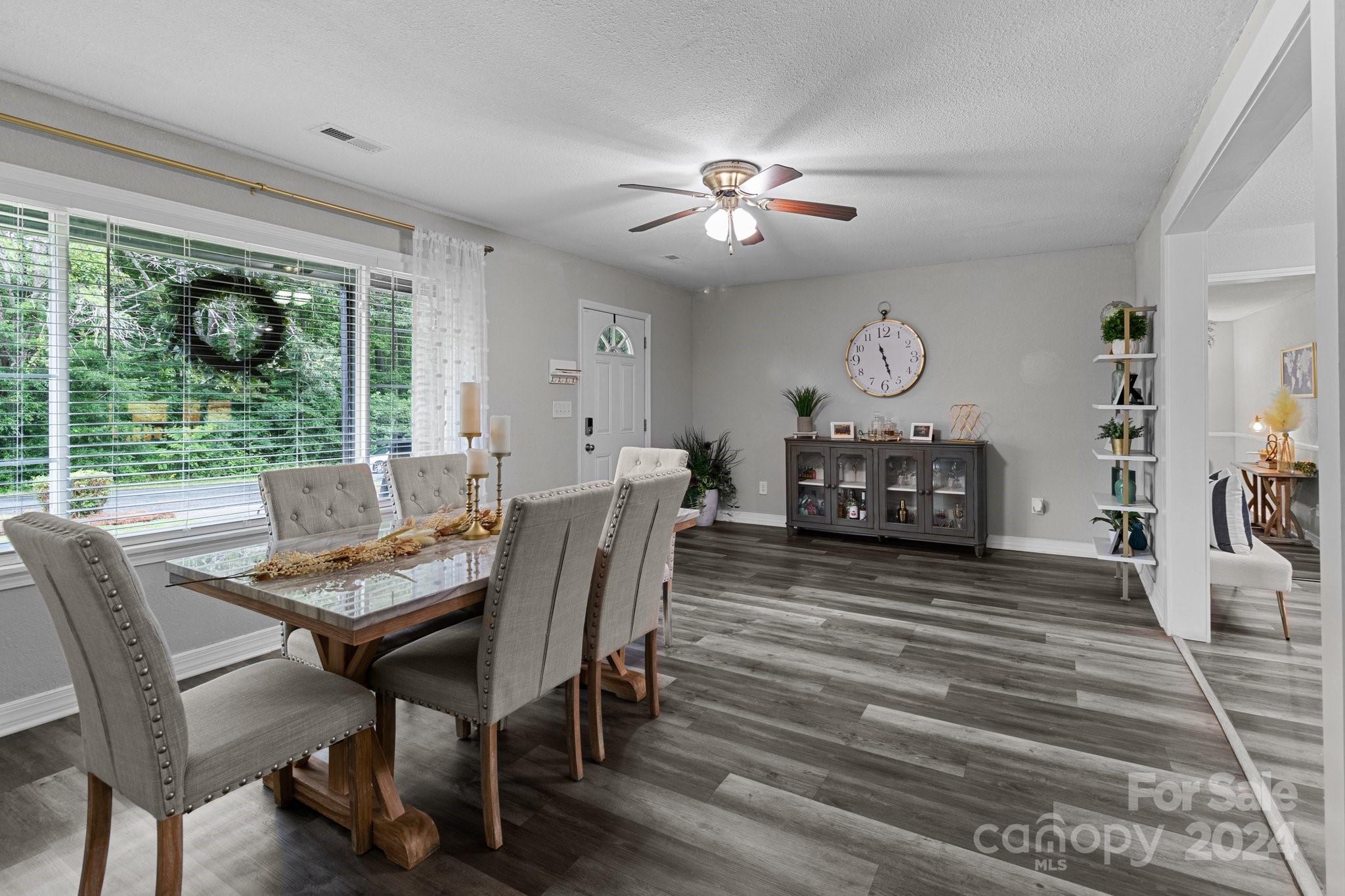 955 Lakeview Road Salisbury, NC 28147 - Photo 6 of 35 a view of a dining room with furniture window and wooden floor