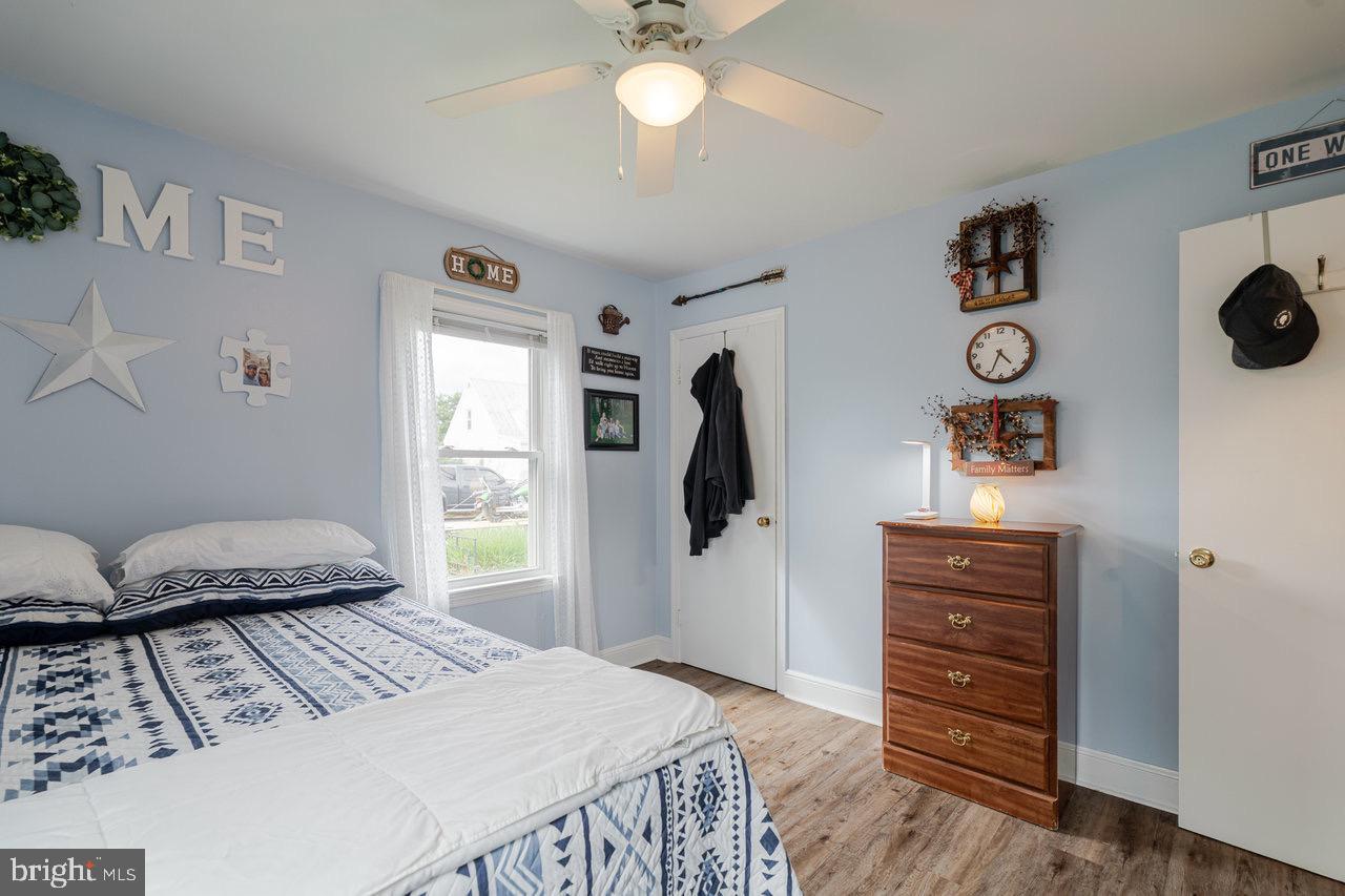 257 Center Street Timberville, VA 22853 - Photo 18 of 73 a bedroom with a bed and a television