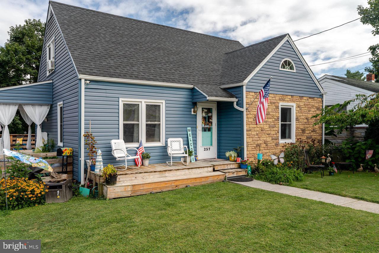 257 Center Street Timberville, VA 22853 - Photo 3 of 73 a front view of a house with a yard