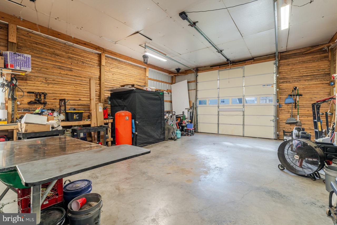 257 Center Street Timberville, VA 22853 - Photo 37 of 73 a view of parking garage with cars