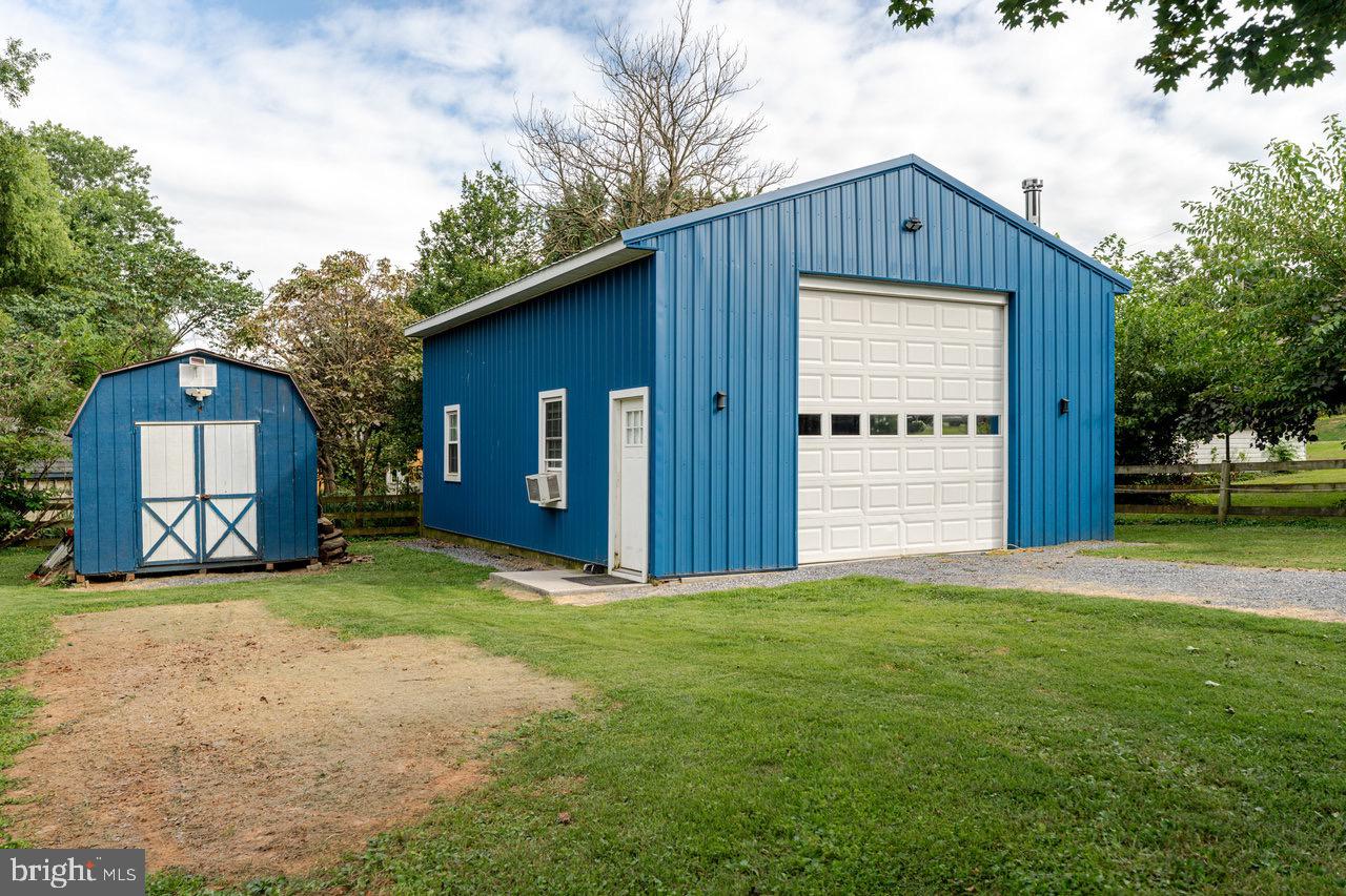 257 Center Street Timberville, VA 22853 - Photo 43 of 73 a front view of a house with a yard