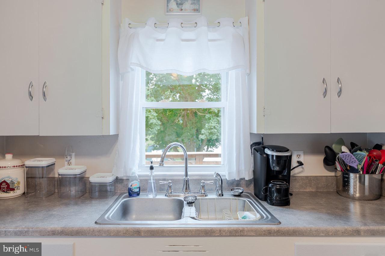 257 Center Street Timberville, VA 22853 - Photo 6 of 73 a kitchen with a sink and a large window