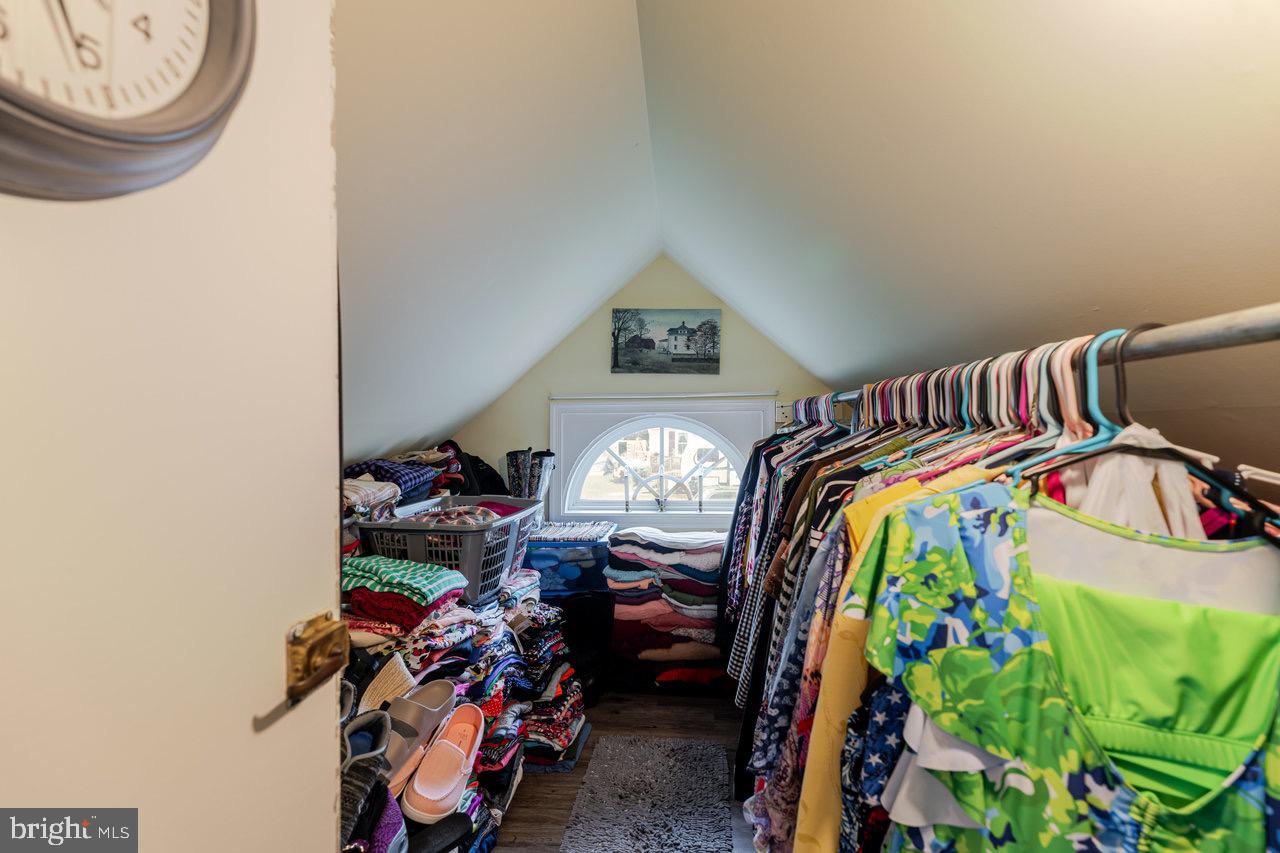 257 Center Street Timberville, VA 22853 - Photo 68 of 73 a view of walk in closet with clothes and shoes