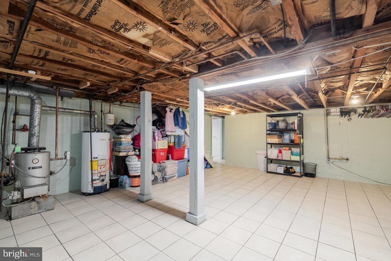 257 Center Street Timberville, VA 22853 - Photo 70 of 73 a view of water heater room with refrigerator