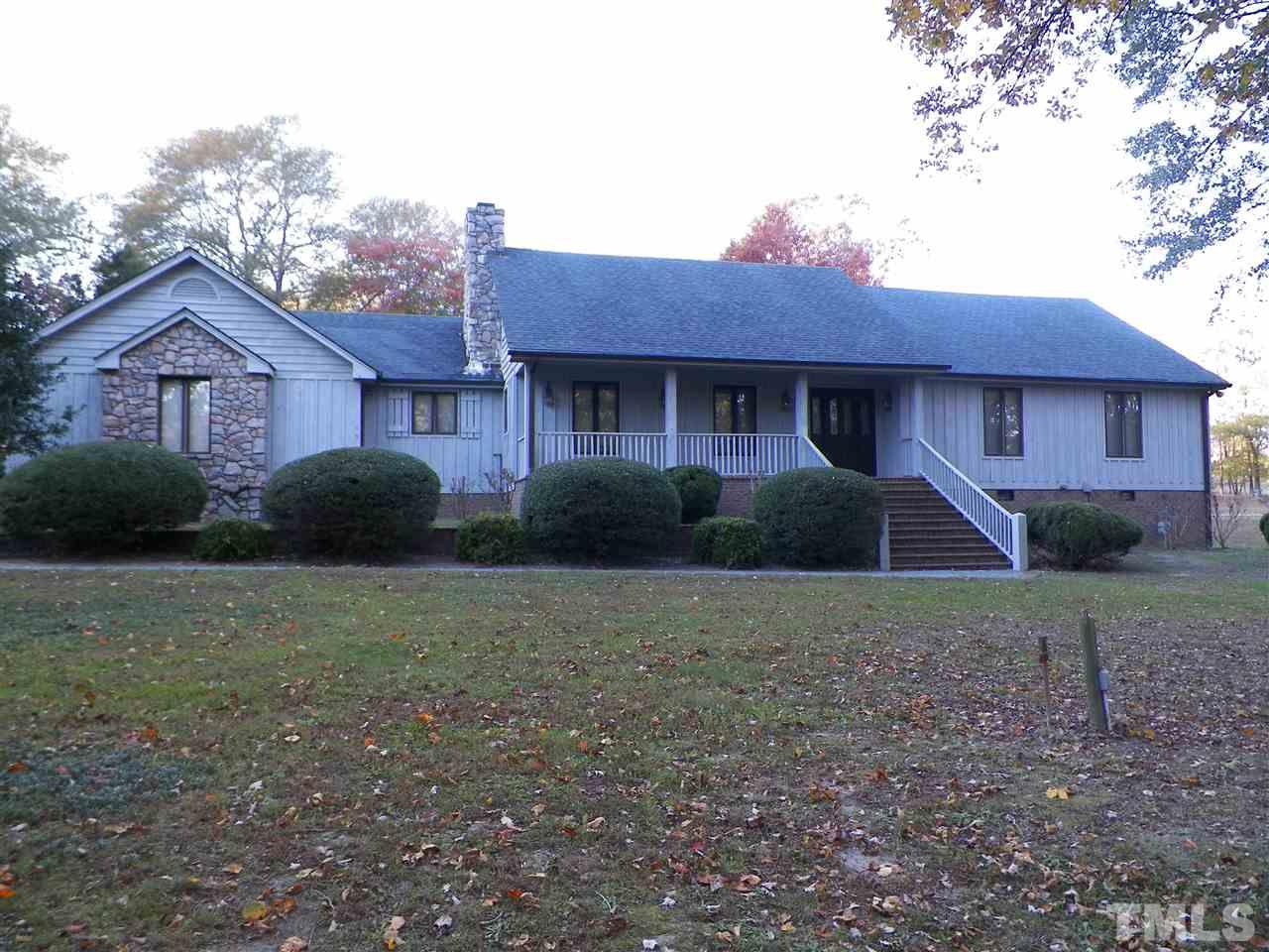 6627 Battle Bridge Road Raleigh, NC 27610 - Photo 1 of 25 a view of a house with a yard
