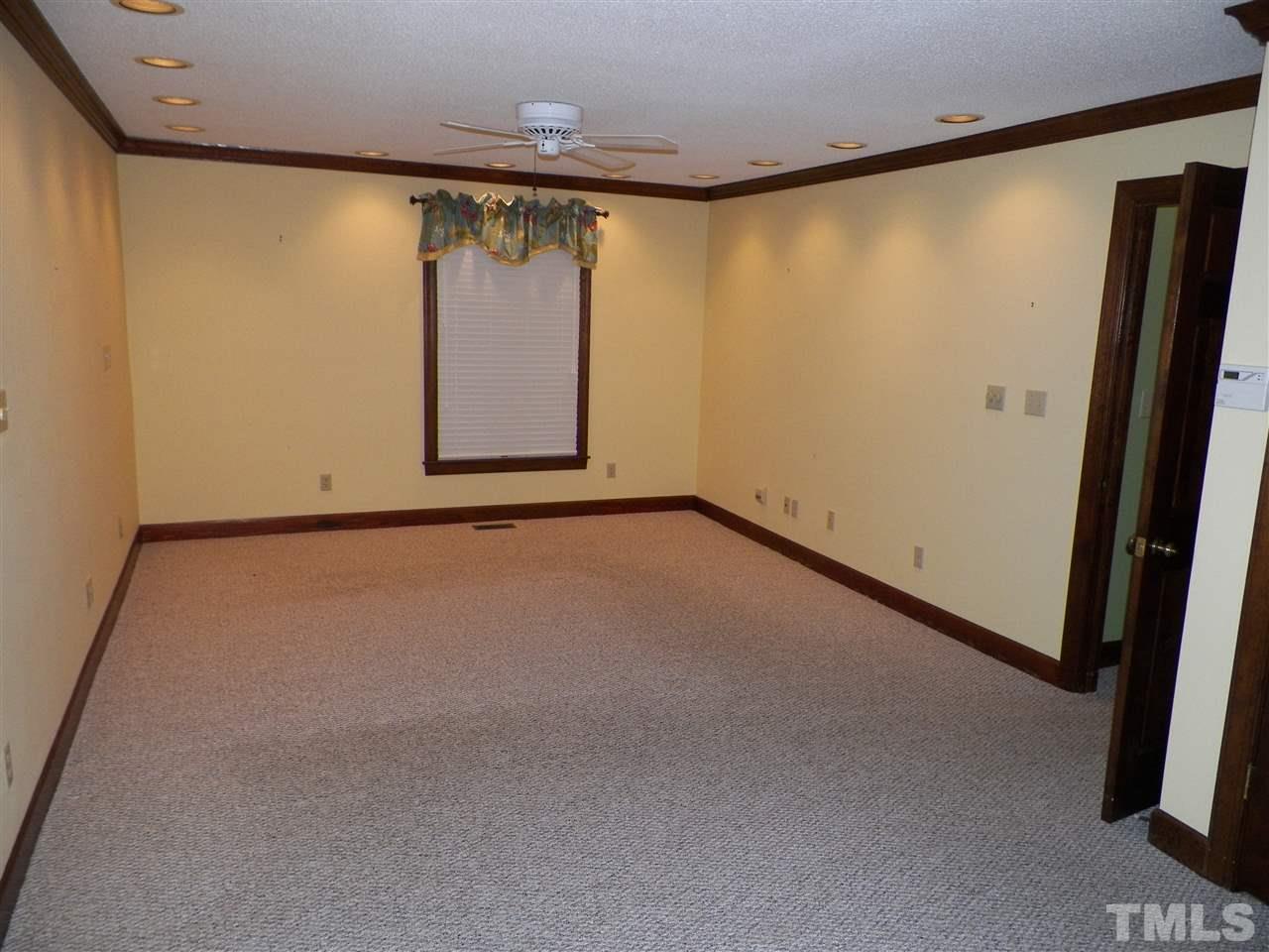 6627 Battle Bridge Road Raleigh, NC 27610 - Photo 17 of 25 a view of a garage