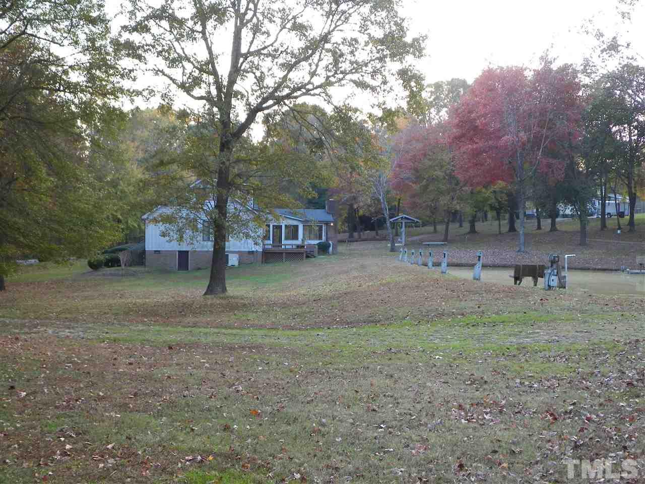 6627 Battle Bridge Road Raleigh, NC 27610 - Photo 3 of 25 a view of outdoor space with deck and trees