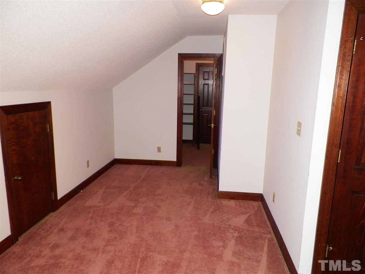 6627 Battle Bridge Road Raleigh, NC 27610 - Photo 24 of 25 an empty room with an entrance and hallway