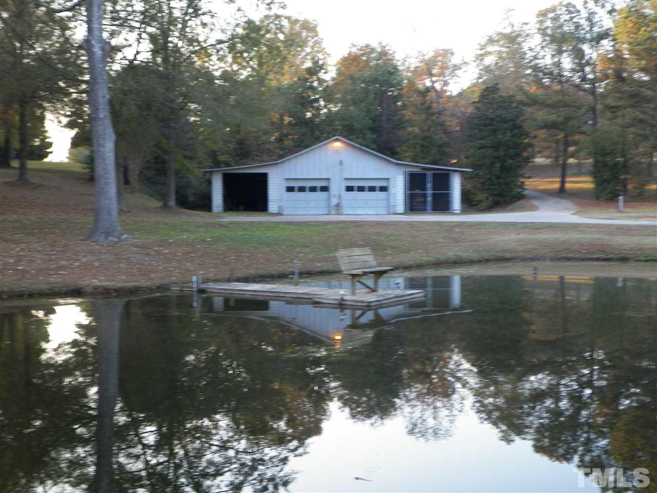 6627 Battle Bridge Road Raleigh, NC 27610 - Photo 5 of 25 a view of a house with a yard