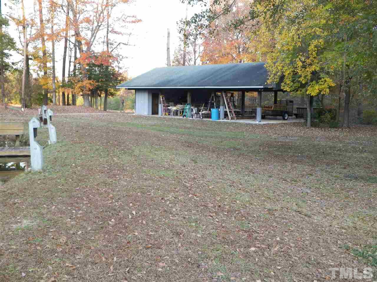 6627 Battle Bridge Road Raleigh, NC 27610 - Photo 7 of 25 a front view of a house with a yard