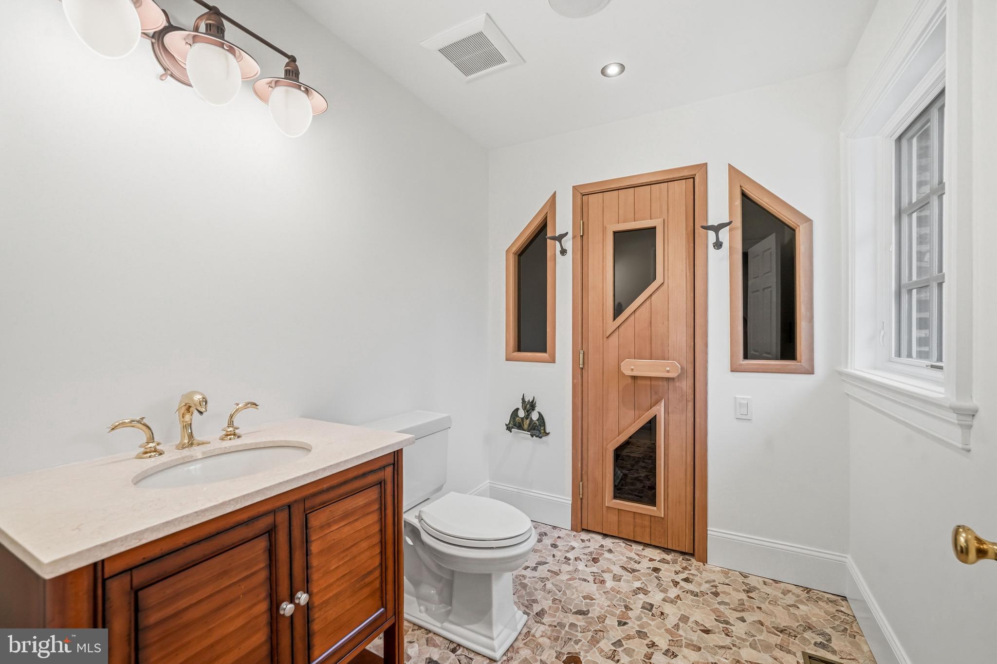 41 Tunbridge Road Haverford, PA 19041 - Photo 56 of 99 powder room and sauna in man cave