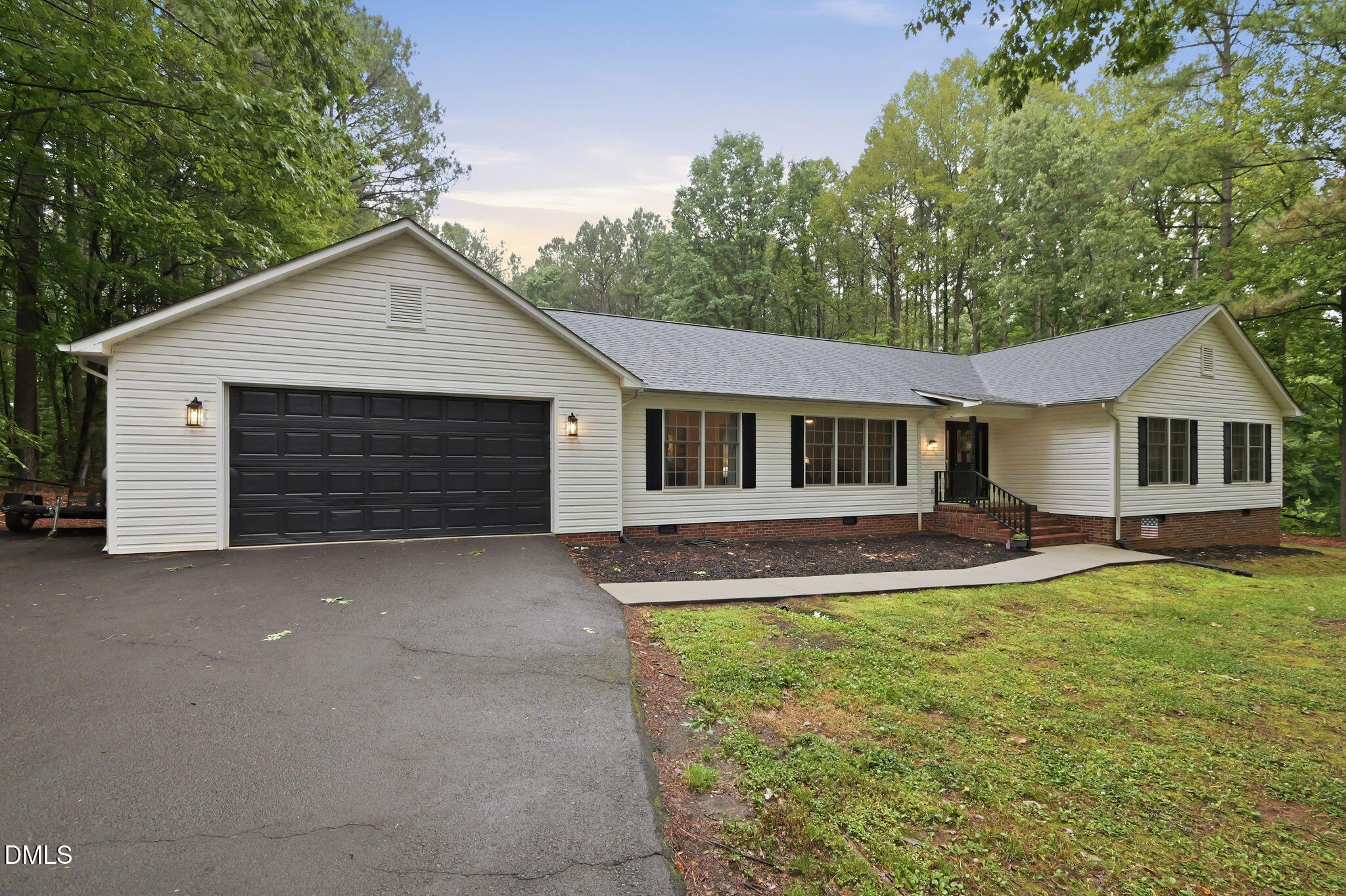 1925 Old Allensville Road Roxboro, NC 27574 - Photo 2 of 58 a front view of a house with yard