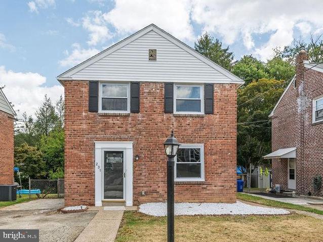 231 East Avon Road Brookhaven, PA 19015 - Photo 2 of 33 a front view of a house with a yard