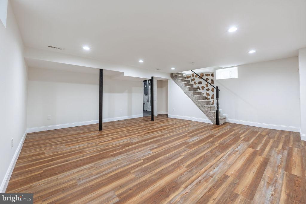 231 East Avon Road Brookhaven, PA 19015 - Photo 28 of 33 a view of an empty room with wooden floor