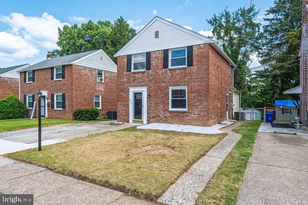 231 East Avon Road Brookhaven, PA 19015 - Photo 3 of 33 a front view of a house with a yard