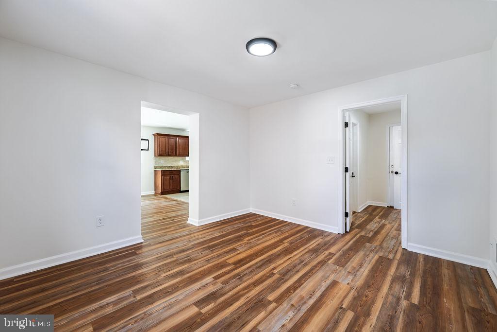 231 East Avon Road Brookhaven, PA 19015 - Photo 8 of 33 a view of empty room with wooden floor