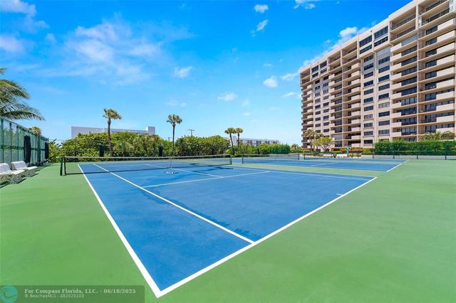 a front view of a building with garden