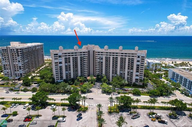 a view of a city with tall buildings