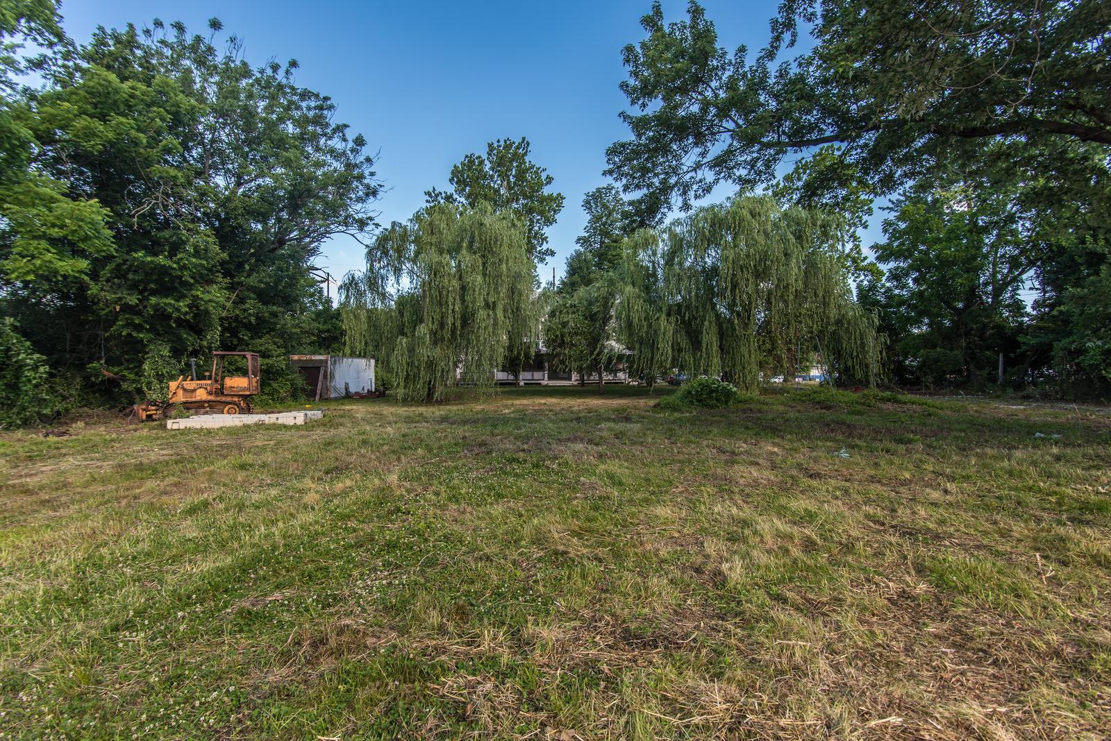 169 State Rd. Bensalem, PA 19020 - Photo 8 of 100 a backyard of a house with table and chairs