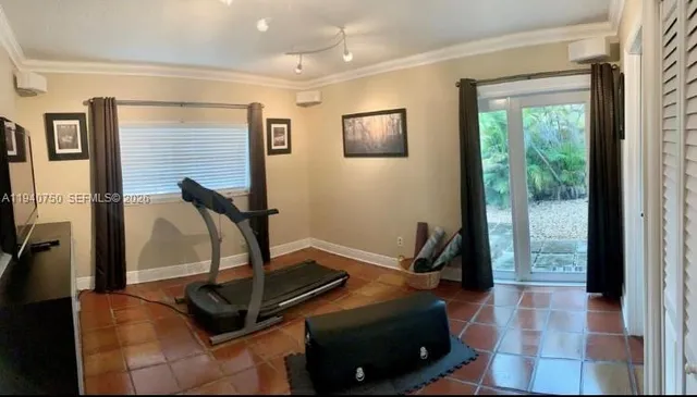 a view of a room with gym equipment