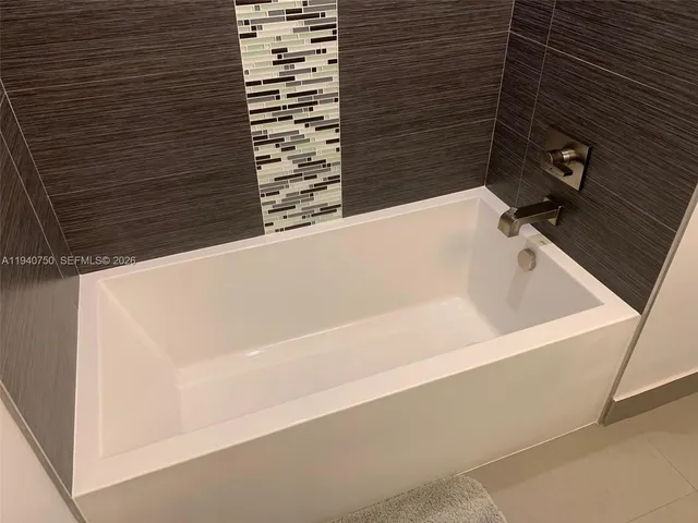 a bathroom with a bathtub