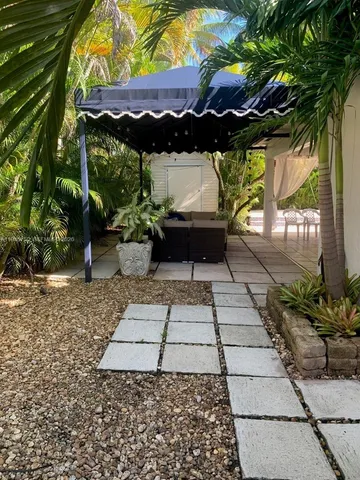 a view of swimming pool with a patio