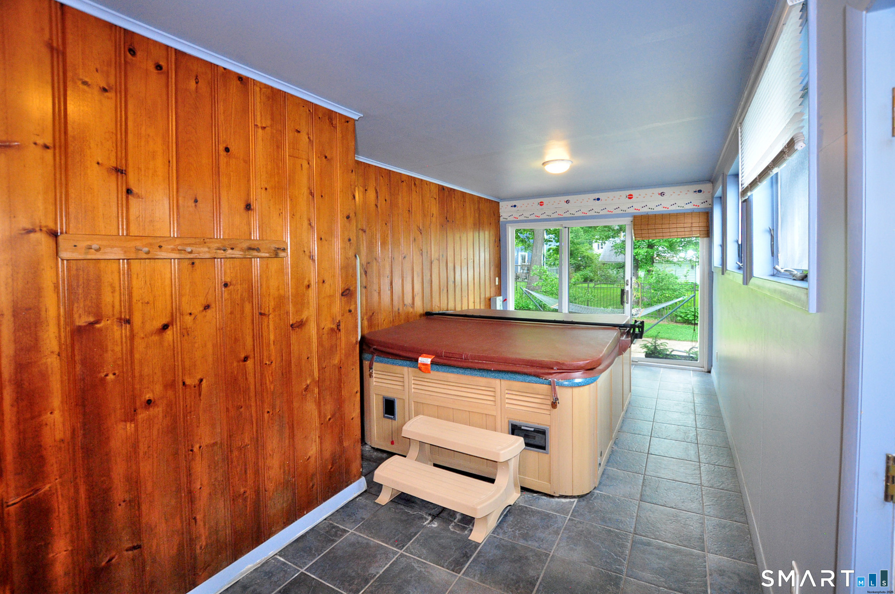 44 Miamis Road West Hartford, CT 06117 - Photo 21 of 39 a room with a door and windows