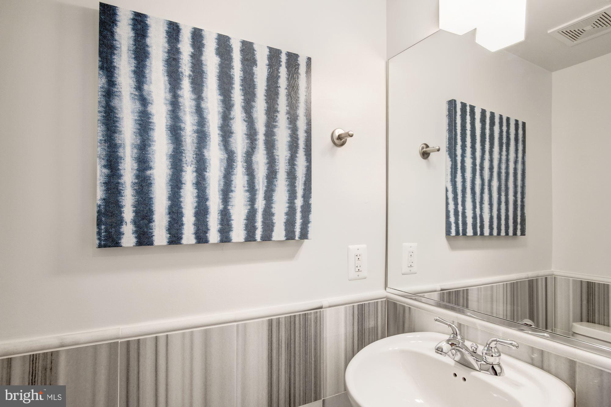 1354 Euclid Street Northwest, Unit 201B Washington, DC 20009 - Photo 17 of 30 Turkish marble half bath