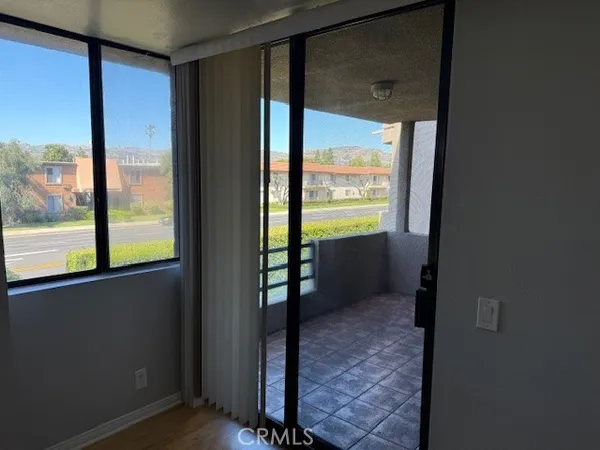 a view of an empty room and window