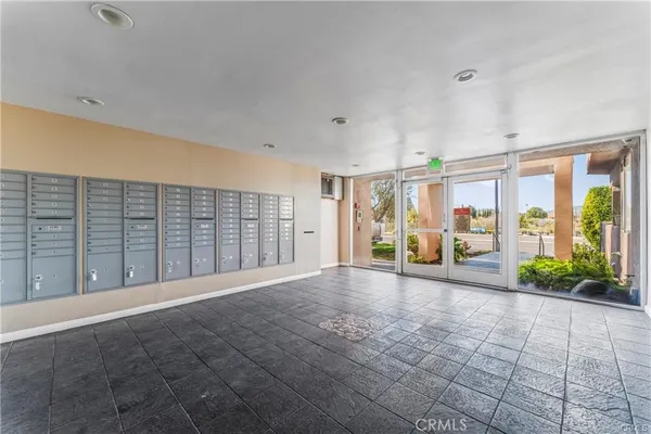 a view of an empty room with windows