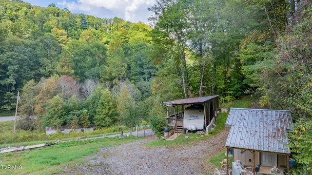 $300,000 | 4966 Old Asheville Highway, Flag Pond, TN 37657