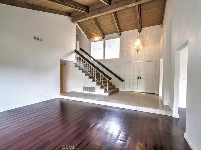 a view of entryway with wooden floor
