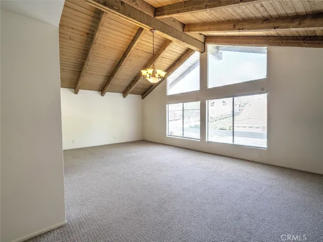 a view of a room with a large window