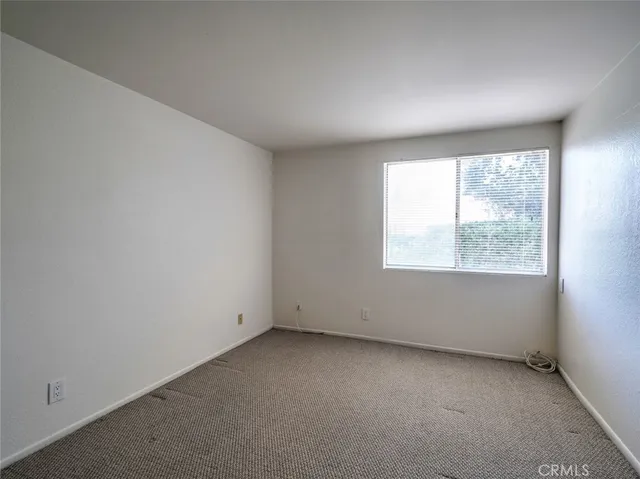 an empty room with a closet