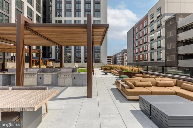 a view of a building and outdoor seating