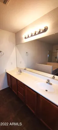 a bathroom with a shower and toilet