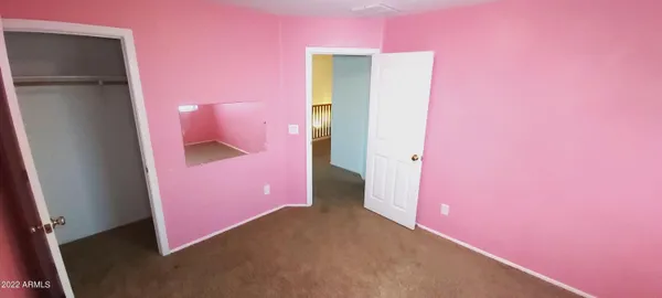 a bathroom with a sink a toilet and vanity