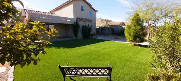 a view of a yard with a house