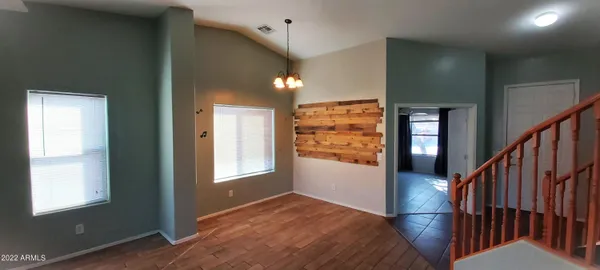 a view of kitchen with cabinets