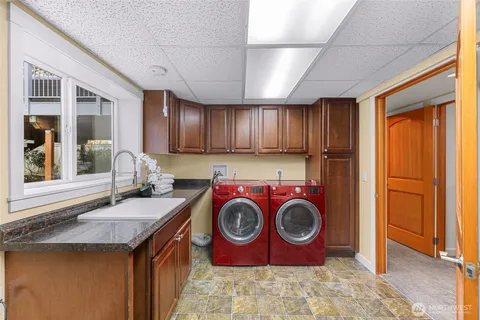 a bathroom with a sink and a stove