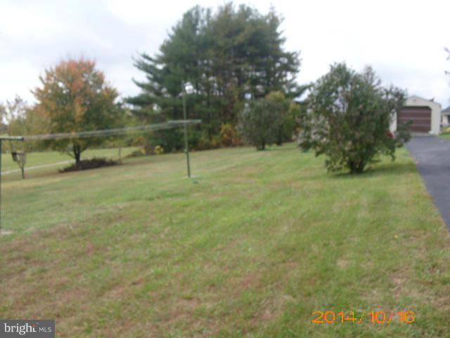20012 Grave Run Road Hampstead, MD 21074 - Photo 14 of 15 a view of a field with a tree