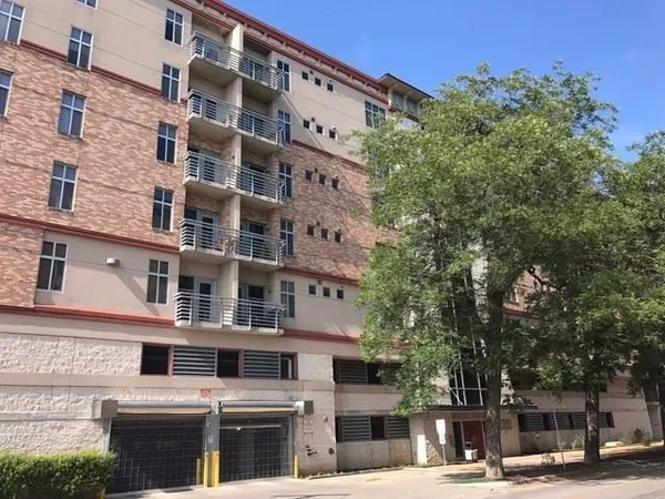 a view of a building with a street