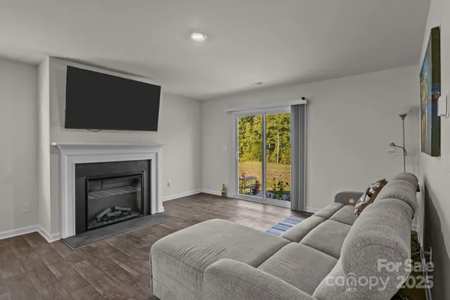 a bed room with a bed and a fireplace