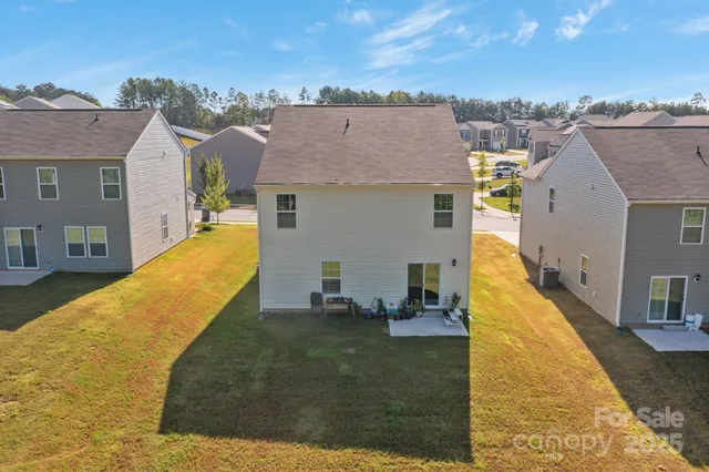 a view of a patio with swimming pool