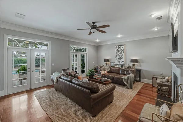 a view of a dining room with furniture window and wooden floor